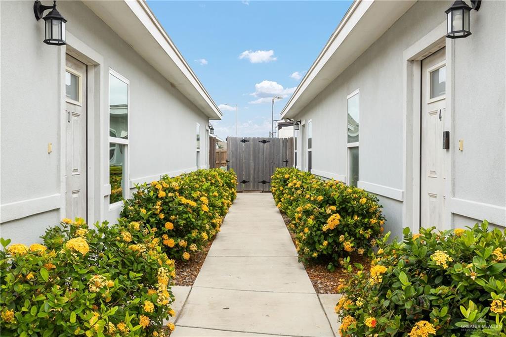 1804 Stauffer Street Weslaco, TX 78596 - Photo 5 of 17 a view of entryway with flower pots