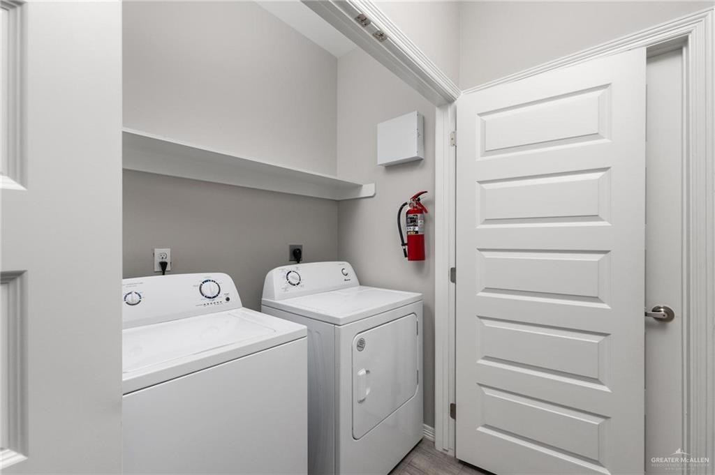 1804 Stauffer Street Weslaco, TX 78596 - Photo 8 of 23 a utility room with dryer and washer