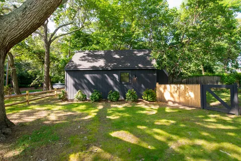 a view of swimming pool with a yard