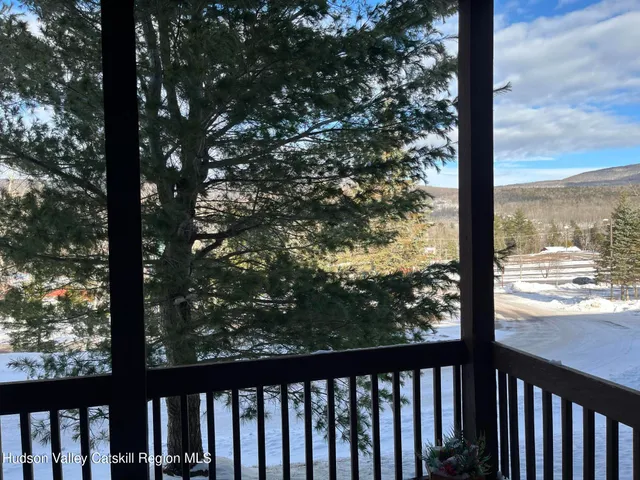 a view of a street from a balcony