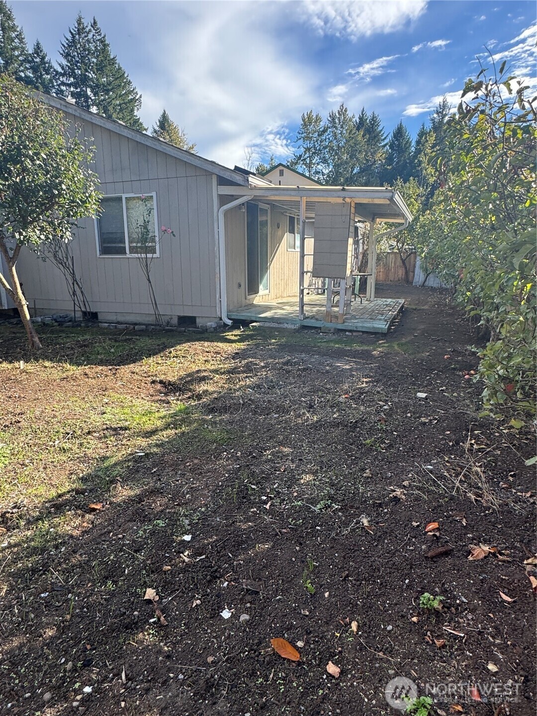 5920 Compton Loop Southeast Lacey, WA 98513 - Photo 27 of 37 a view of a house with backyard and sitting area