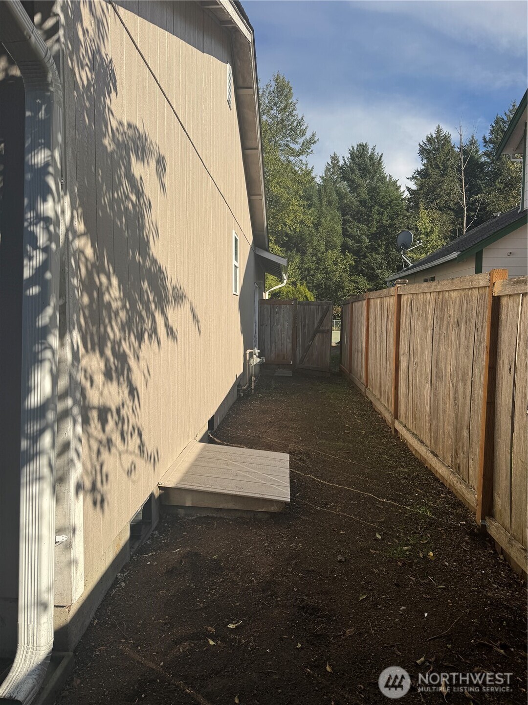 5920 Compton Loop Southeast Lacey, WA 98513 - Photo 30 of 37 a view of backyard with wooden fence