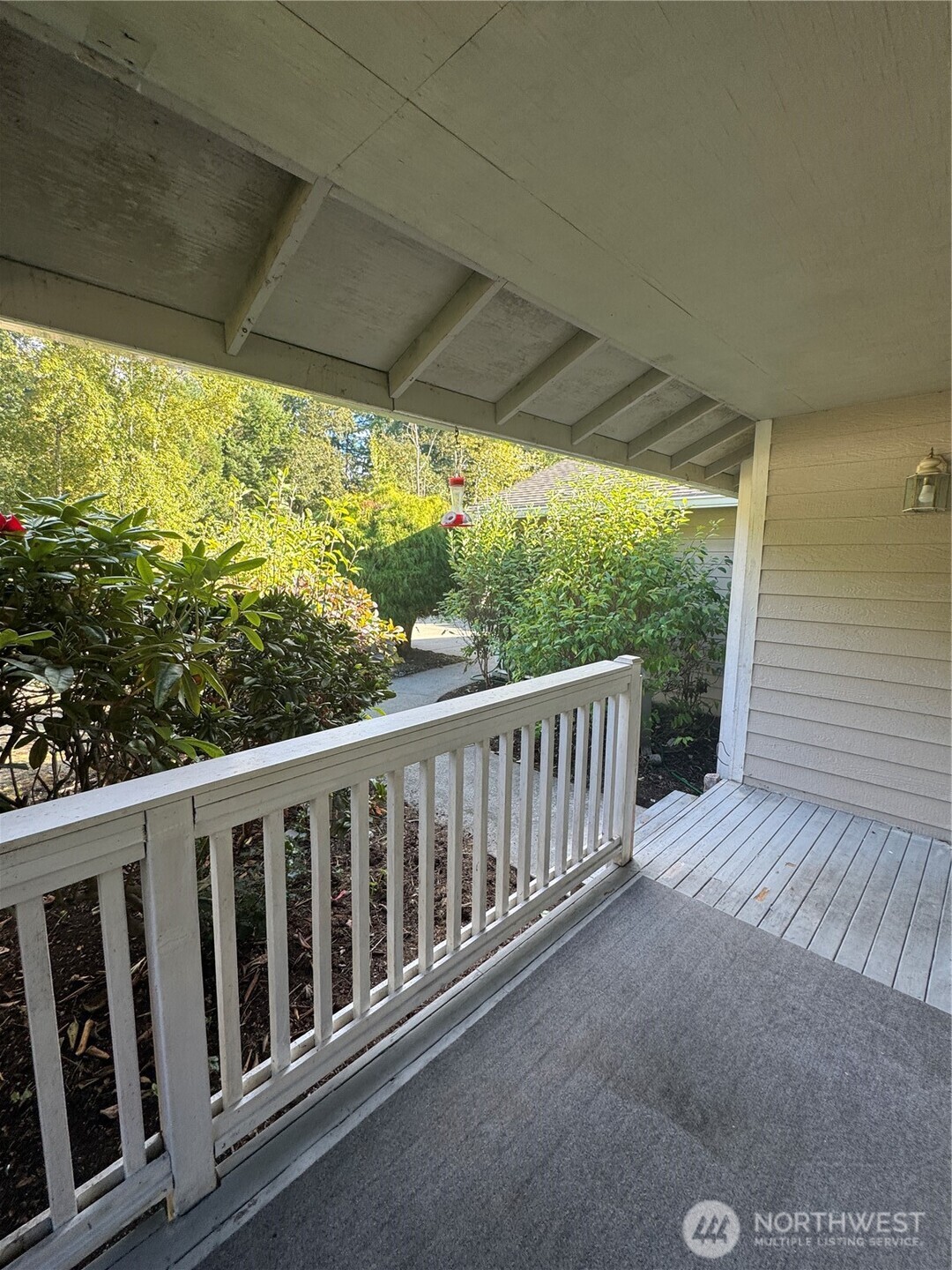 5920 Compton Loop Southeast Lacey, WA 98513 - Photo 8 of 37 a balcony with wooden floor