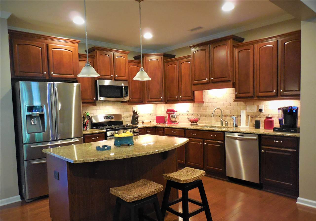 1235 Silver Beach Way Raleigh, NC 27606 - Photo 3 of 30 Gorgeous cherry cabinets with upgraded upper crown molding and under cabinet lights. Gorgeous Cabinets