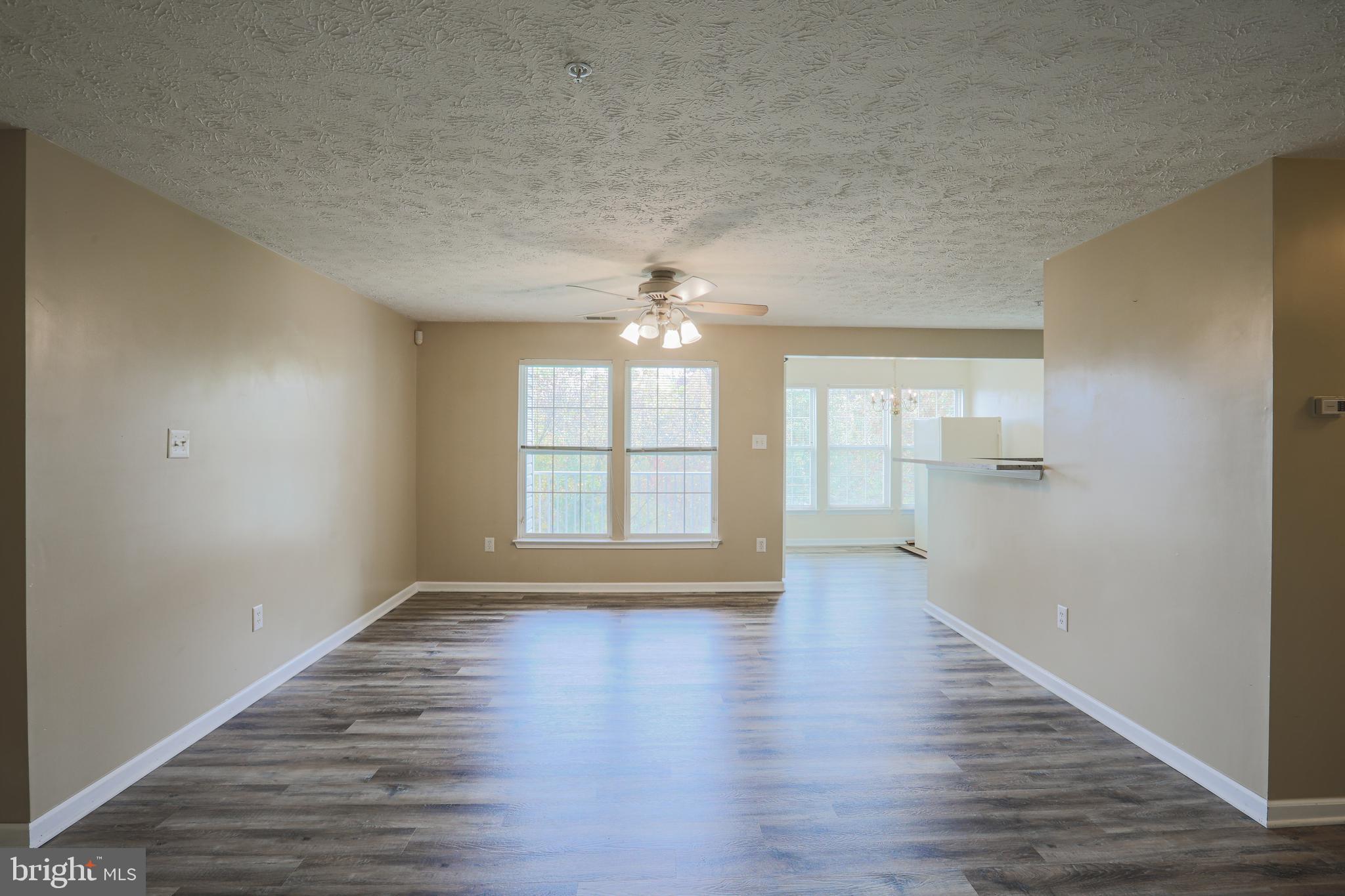 9754 Reese Farm Road Owings Mills, MD 21117 - Photo 10 of 39 Living room and Dining room areas