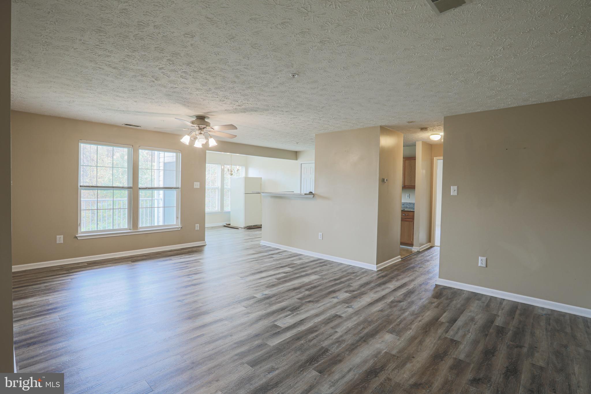 9754 Reese Farm Road Owings Mills, MD 21117 - Photo 7 of 39 NEW waterproof LVT flooring in all the Main Areas