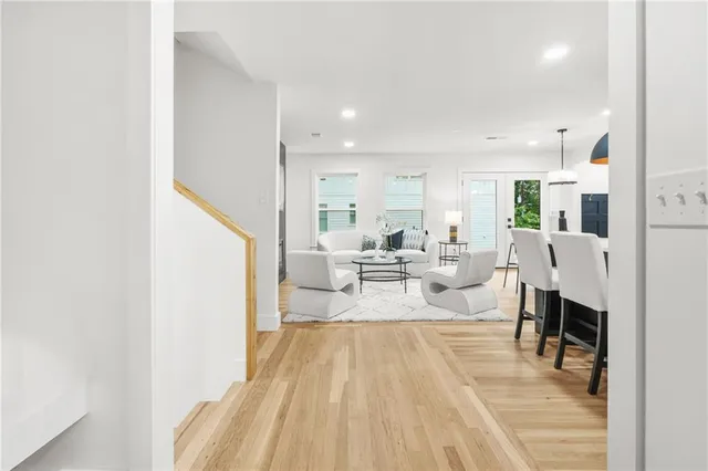 a living room with furniture and a table