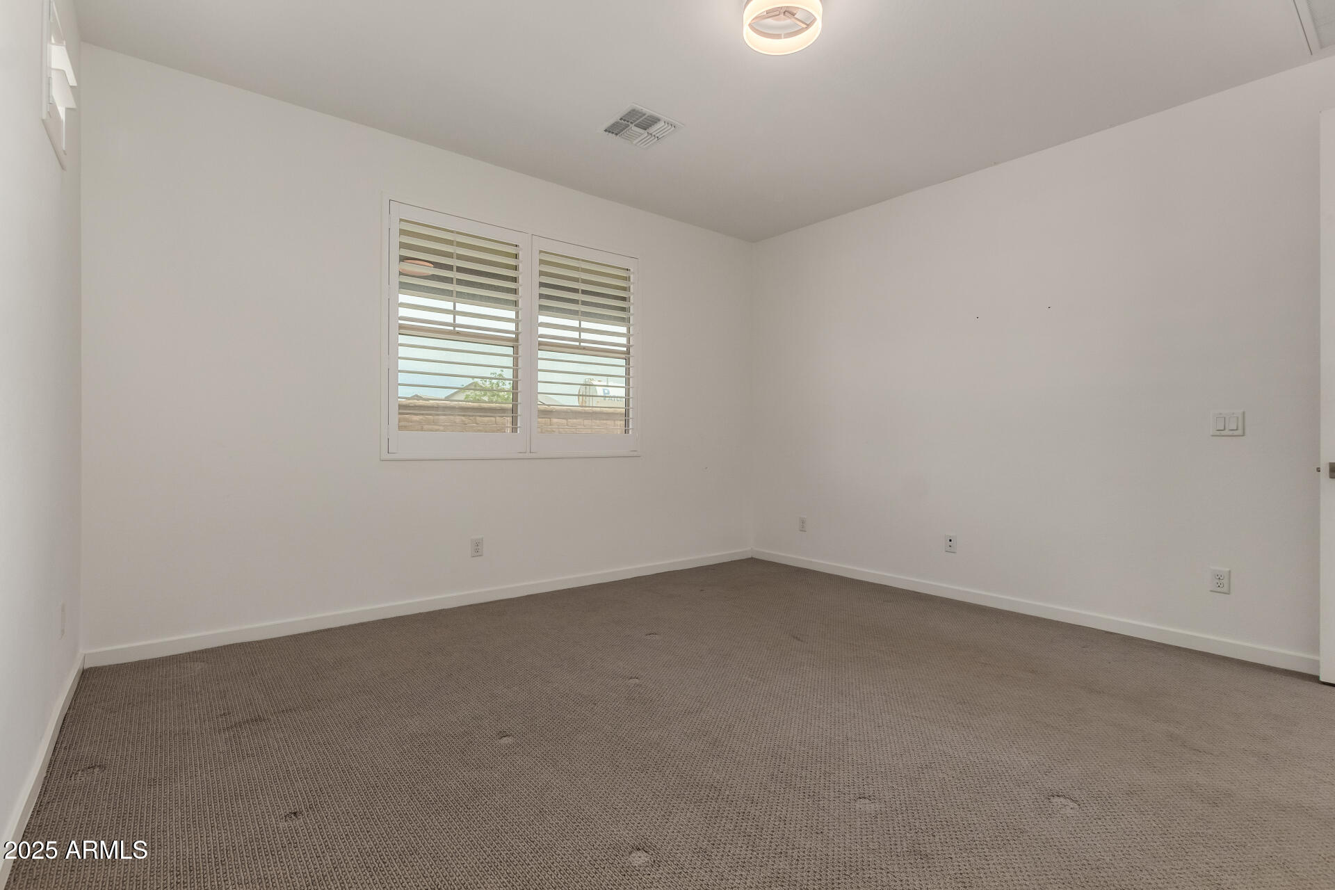 22568 East Rosa Road Queen Creek, AZ 85142 - Photo 17 of 42 Primary Bedroom