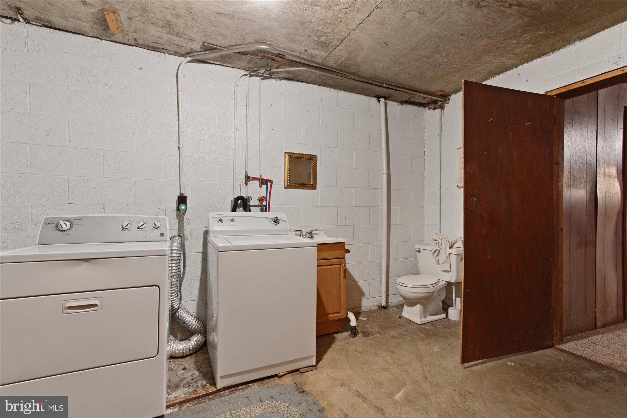 90 Village Road Etters, PA 17319 - Photo 22 of 36 Laundry and 1/2 bath in basement