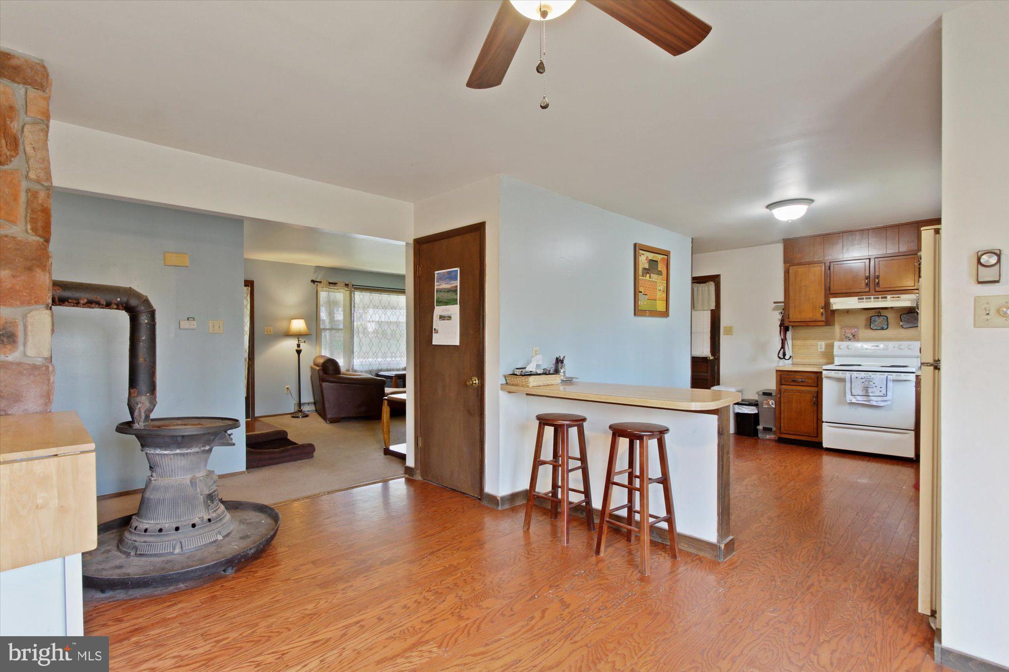 90 Village Road Etters, PA 17319 - Photo 7 of 36 Combo Kitchen/Dining with Coal Stove