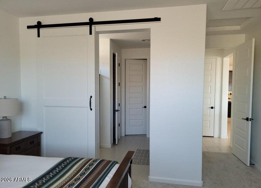 4540 Jackpot Road Wickenburg, AZ 85390 - Photo 6 of 13 a bedroom with a bed and a dresser