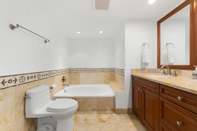 a view of a swimming pool with an outdoor seating