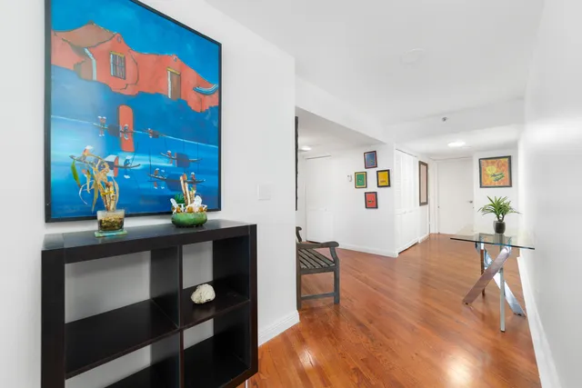 a view of a street with an ocean