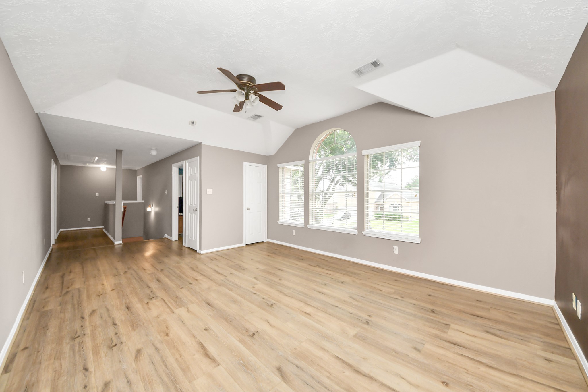 23814 Spring Dane Drive Spring, TX 77373 - Photo 32 of 41 a view of empty room with wooden floor and fan