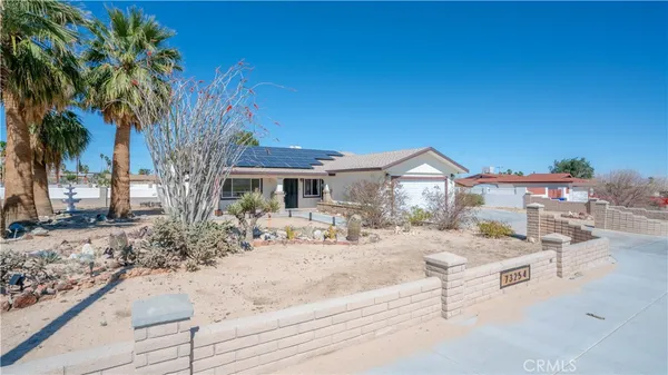 a view of a house with a patio