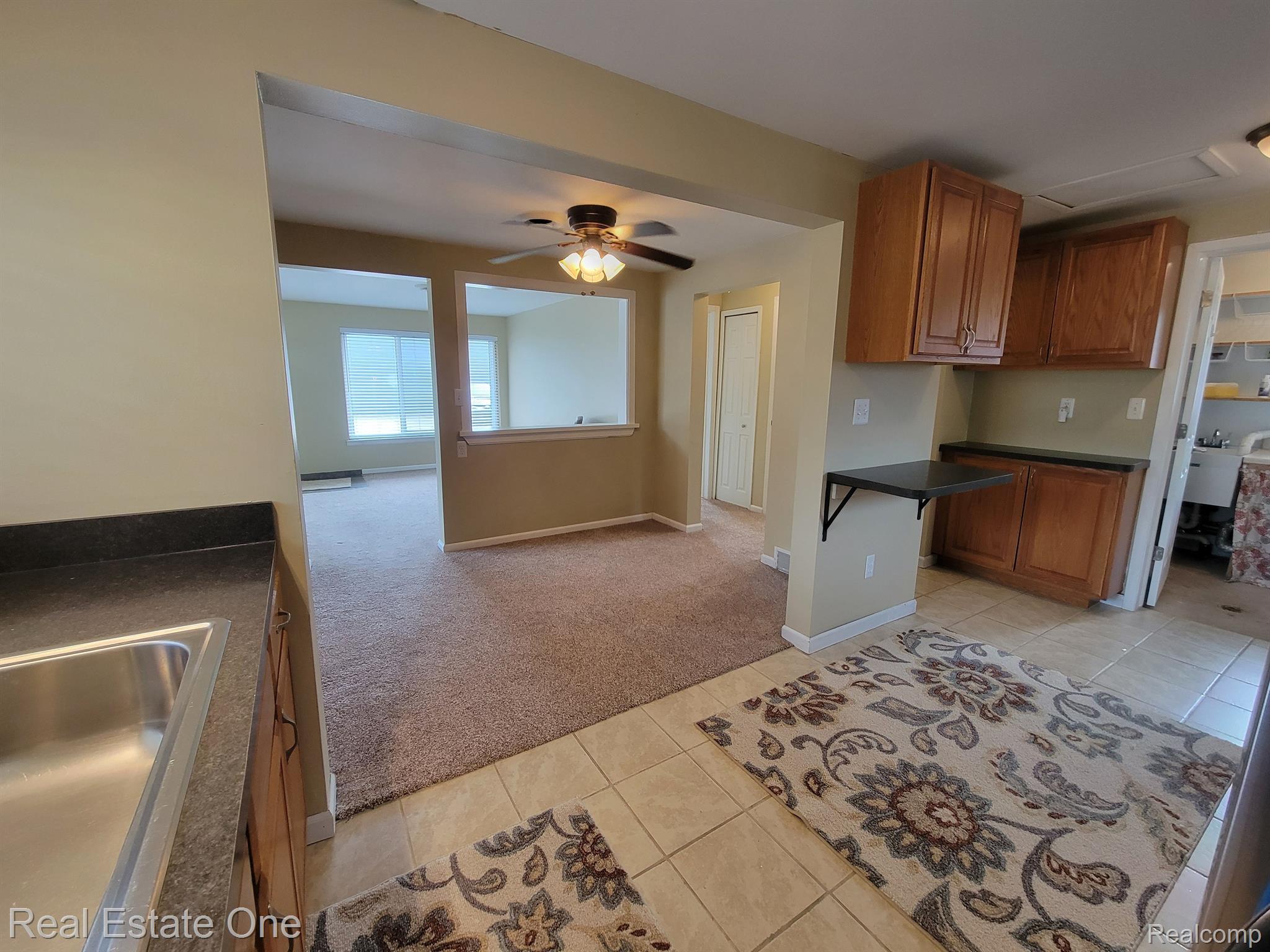 308 North Rochester Road, Unit 1 Clawson, MI 48017 - Photo 7 of 22 Kitchen view towards dining > living