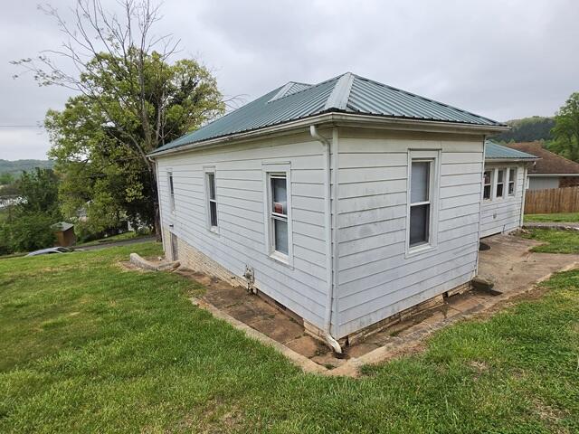 170 10th Street Fieldale, VA 24089 - Photo 14 of 37 a front view of a house with a yard