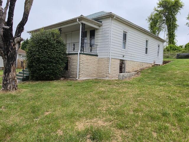170 10th Street Fieldale, VA 24089 - Photo 16 of 37 a view of a backyard of the house