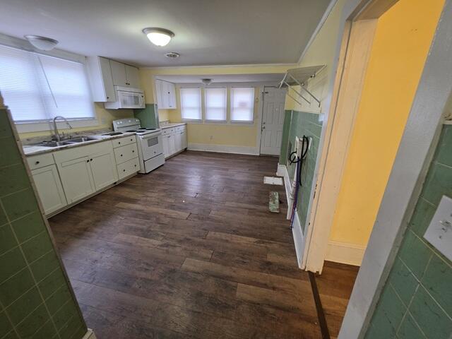 170 10th Street Fieldale, VA 24089 - Photo 26 of 37 a view of a kitchen with fridge and wooden floor
