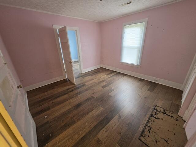170 10th Street Fieldale, VA 24089 - Photo 31 of 37 an empty room with wooden floor and stairs