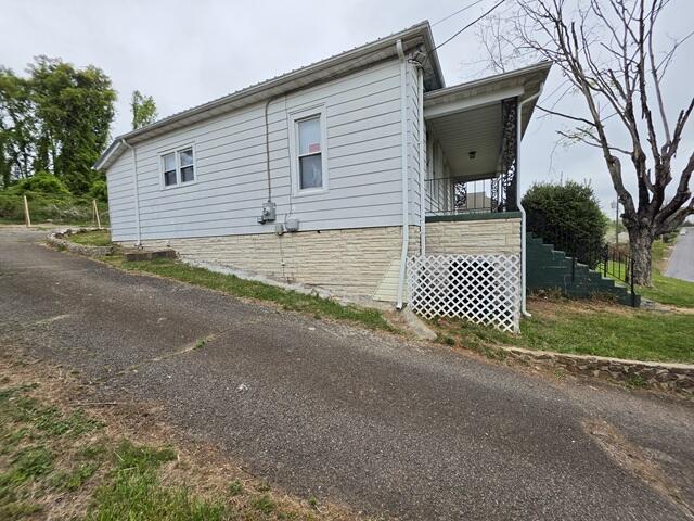 170 10th Street Fieldale, VA 24089 - Photo 8 of 37 a view of a house with a yard and garage
