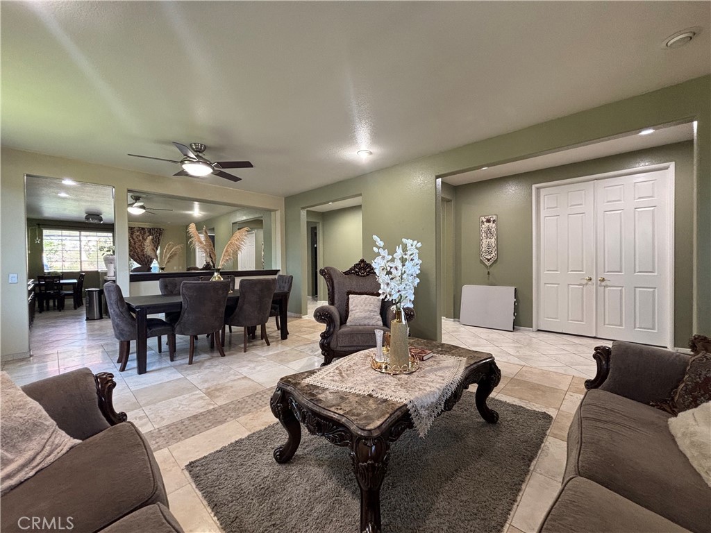 11571 Trailrun Court Riverside, CA 92505 - Photo 3 of 18 a living room with furniture and wooden floor