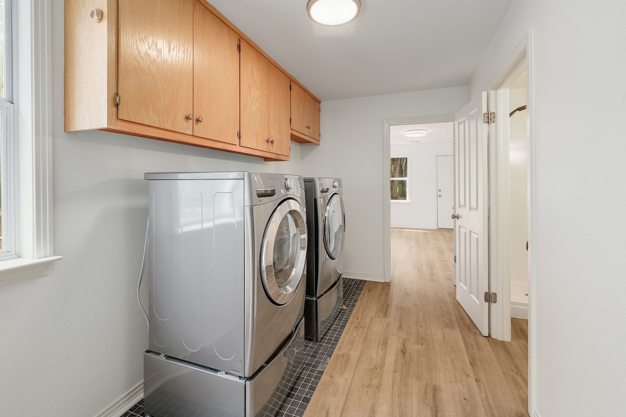 1700 Patterson Road Austin, TX 78733 - Photo 22 of 36 Laundry Room with newer washer and dryer