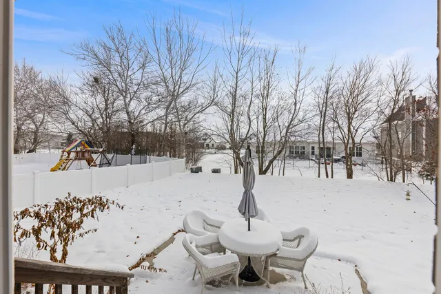 a view of a backyard of snow