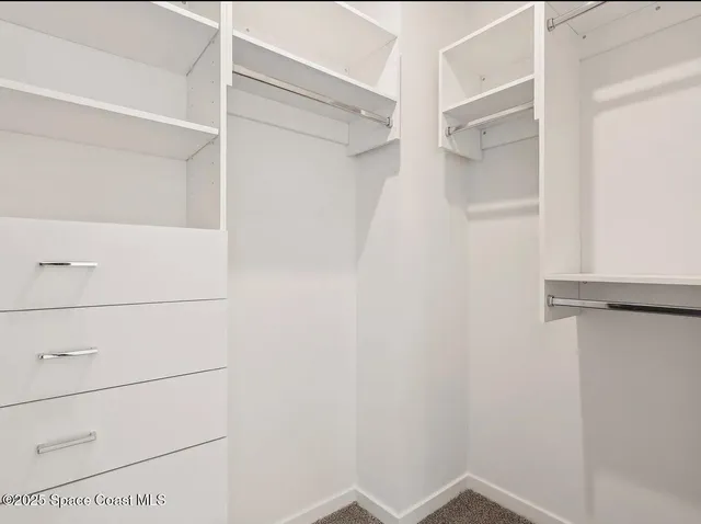 a view of a walk in closet