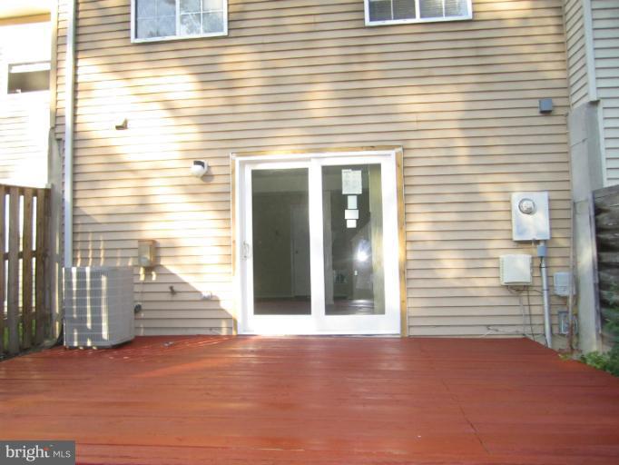 6226 Hillside Road Springfield, VA 22152 - Photo 2 of 30 a view of a house with wooden fence
