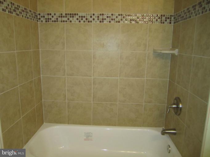 6226 Hillside Road Springfield, VA 22152 - Photo 18 of 30 a bathroom with a shower