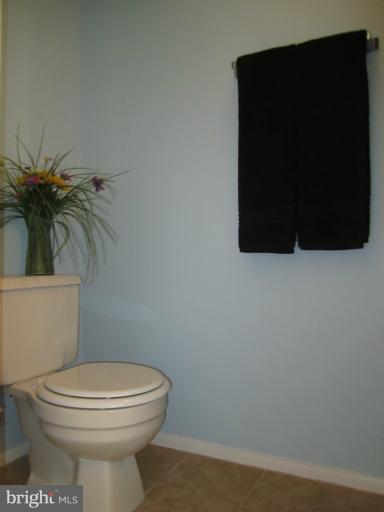 6226 Hillside Road Springfield, VA 22152 - Photo 24 of 30 a bathroom with a toilet and a shower