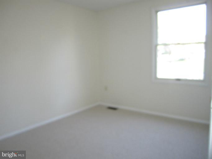 6226 Hillside Road Springfield, VA 22152 - Photo 29 of 30 an empty room with a window
