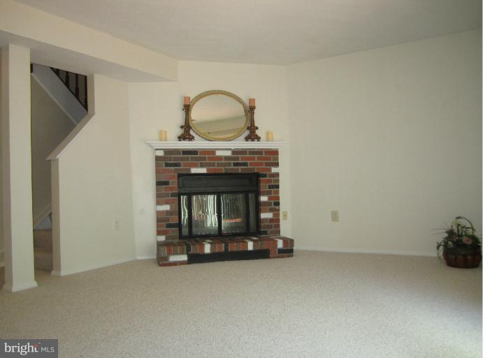 6226 Hillside Road Springfield, VA 22152 - Photo 7 of 30 a view of fireplace with entryway