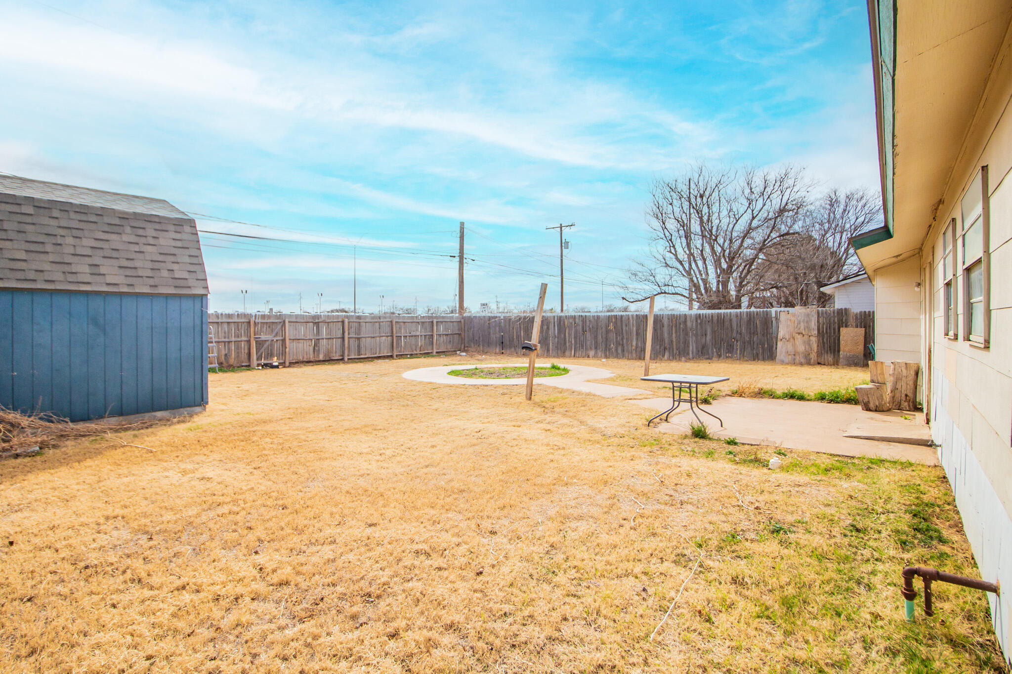 1903 71st Street Lubbock, TX 79412 - Photo 20 of 23 a view of swimming pool with outdoor seating