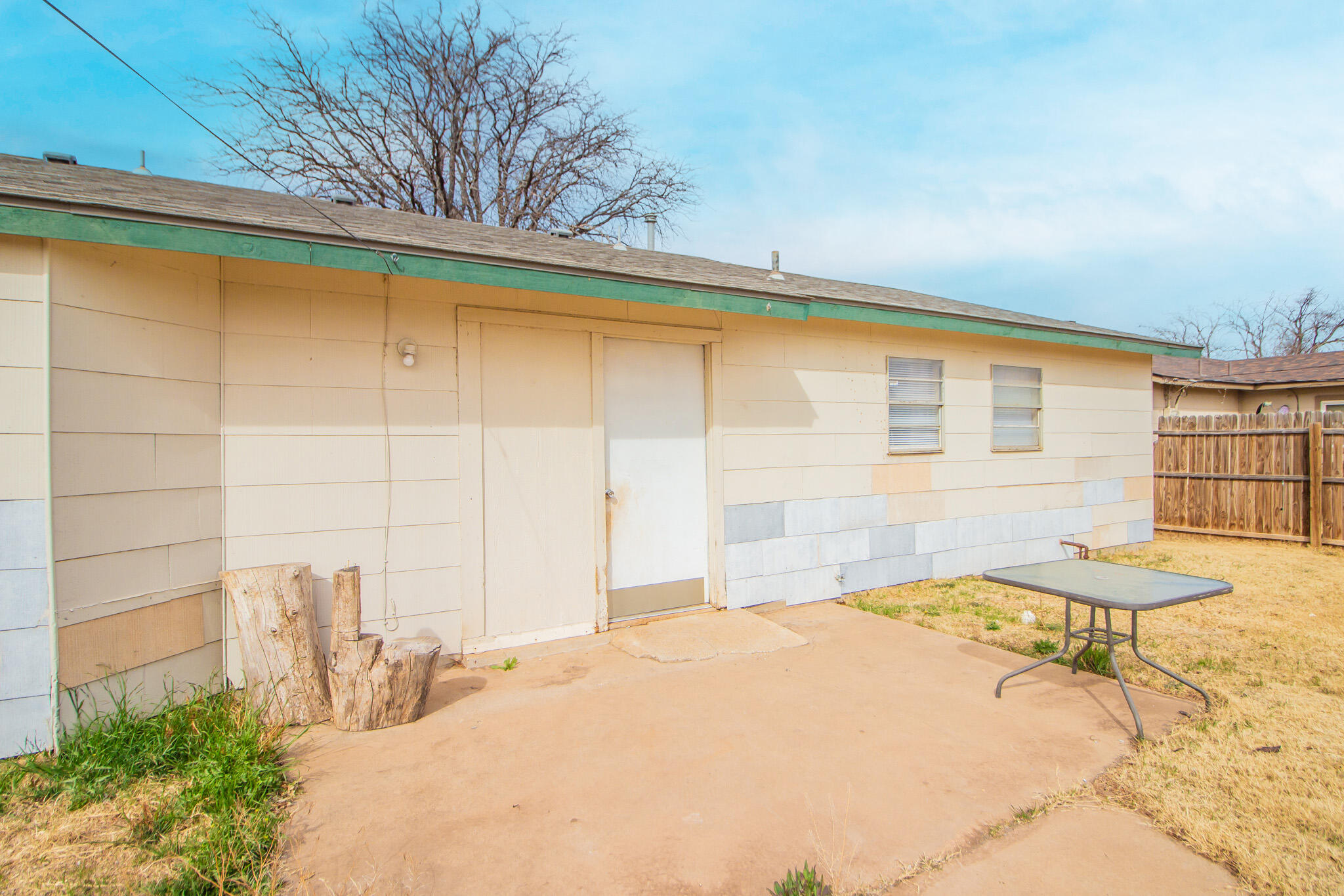 1903 71st Street Lubbock, TX 79412 - Photo 22 of 23 a view of a swimming pool with a lounge chairs
