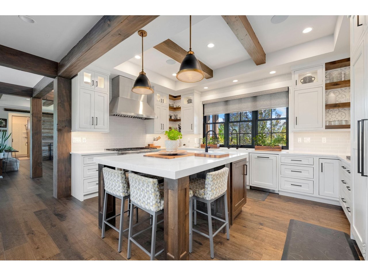 4252 Mountain Shadow Way Timnath, CO 80547 - Photo 15 of 49 Designer kitchen highlighted by premium Thermador appliances
