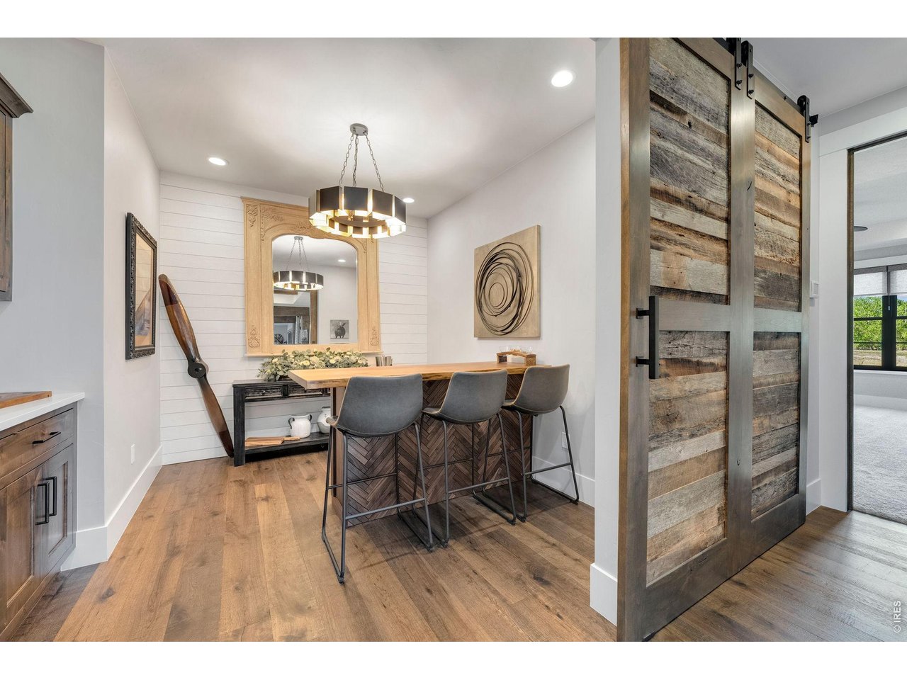 4252 Mountain Shadow Way Timnath, CO 80547 - Photo 21 of 49 Beautifully appointed main-floor office or multipurpose space with sliding barn doors