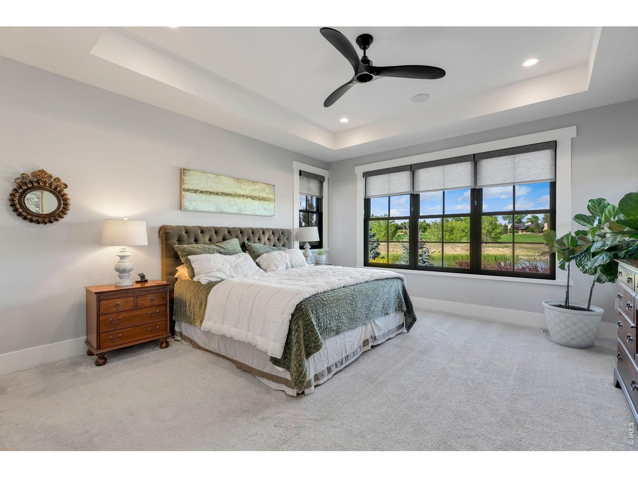 4252 Mountain Shadow Way Timnath, CO 80547 - Photo 22 of 49 Luxurious primary suite overlooking the water