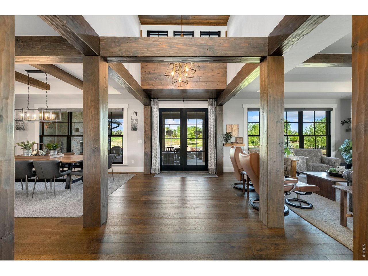 4252 Mountain Shadow Way Timnath, CO 80547 - Photo 7 of 49 Striking grand entrance filled with radiant natural light