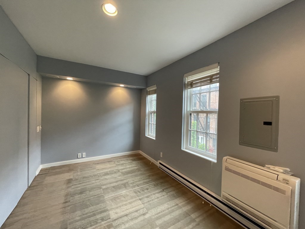 33 Lawrence Street, Unit 2 Boston, MA 02116 - Photo 27 of 38 a view of an empty room with a window