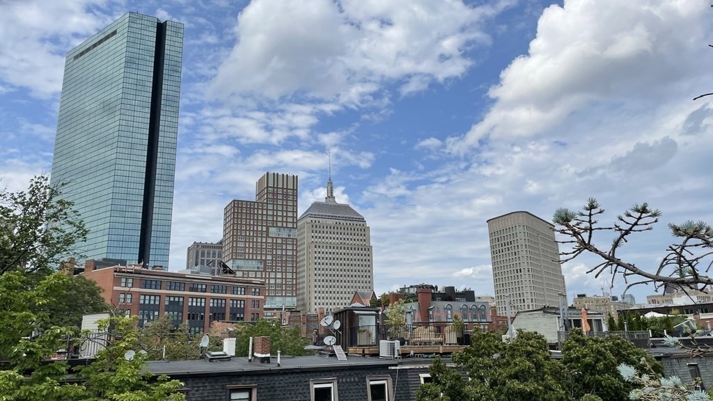 33 Lawrence Street, Unit 2 Boston, MA 02116 - Photo 4 of 38 a view of a multi story building
