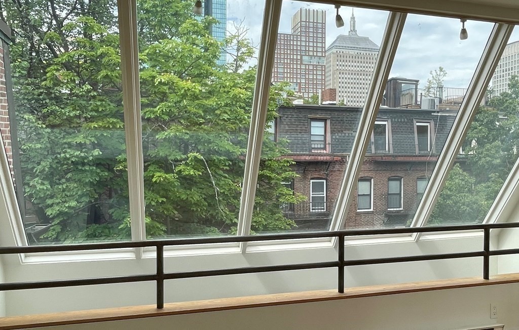 33 Lawrence Street, Unit 2 Boston, MA 02116 - Photo 5 of 38 a view of a glass door with a tree