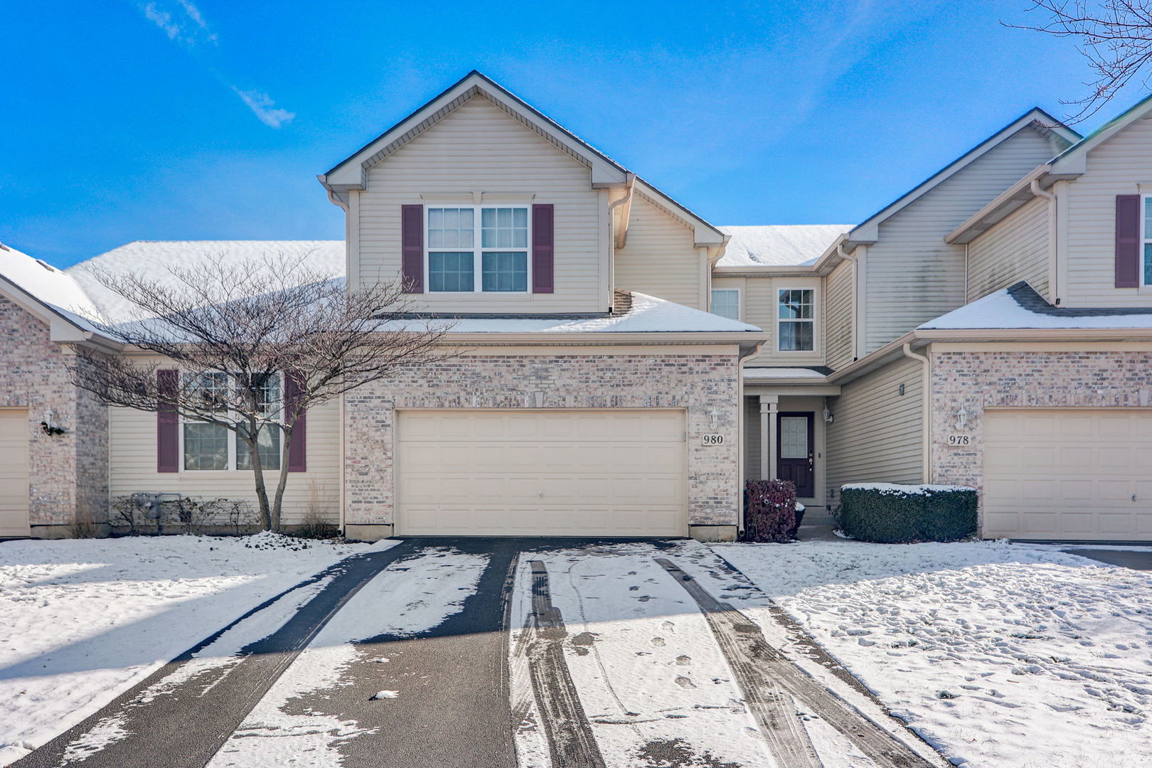 980 Oak Ridge Boulevard Elgin, IL 60120 - Photo 1 of 42 a view of a white house