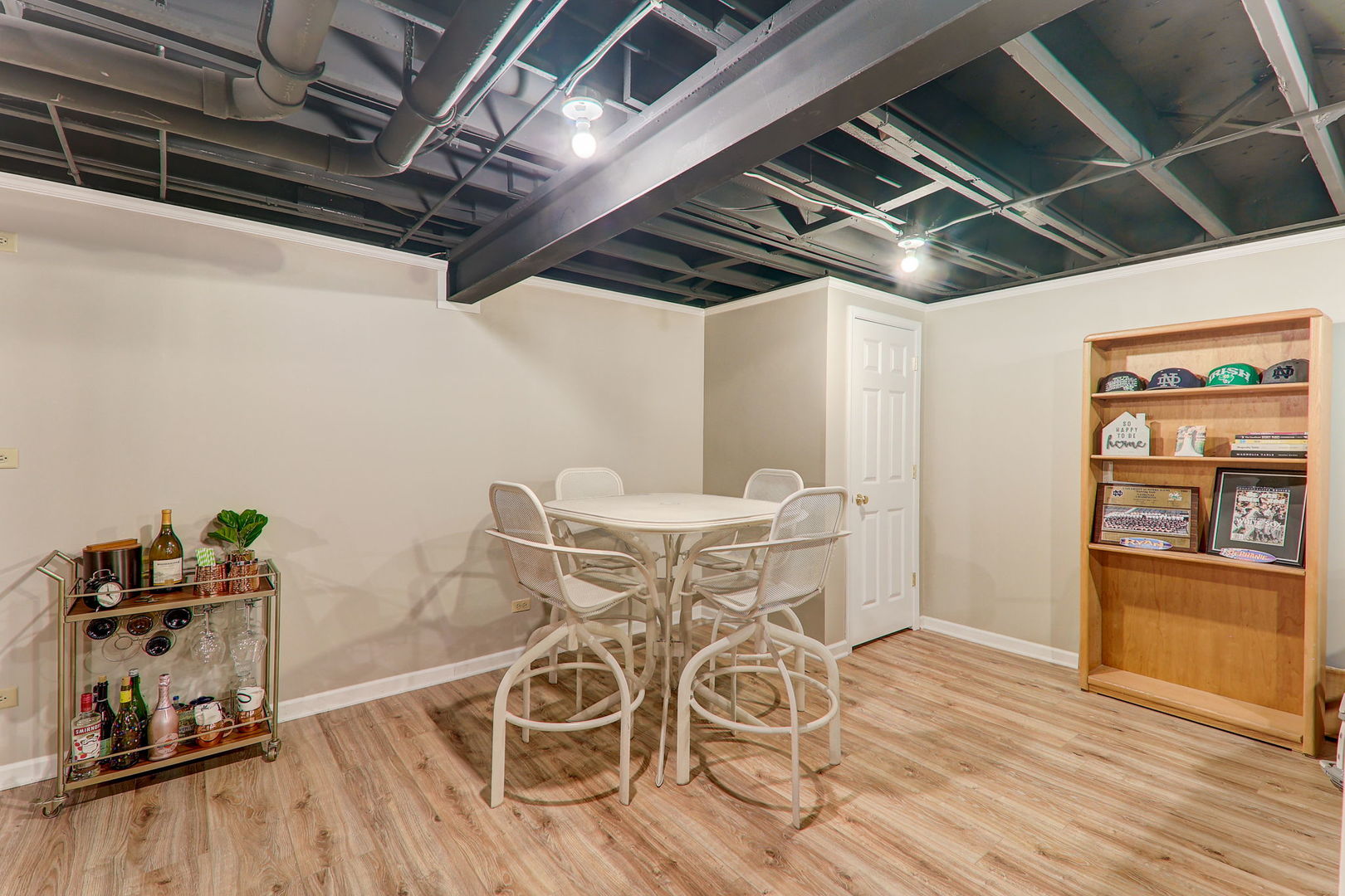 980 Oak Ridge Boulevard Elgin, IL 60120 - Photo 38 of 42 a view of a dining room with furniture wooden floor and a front door