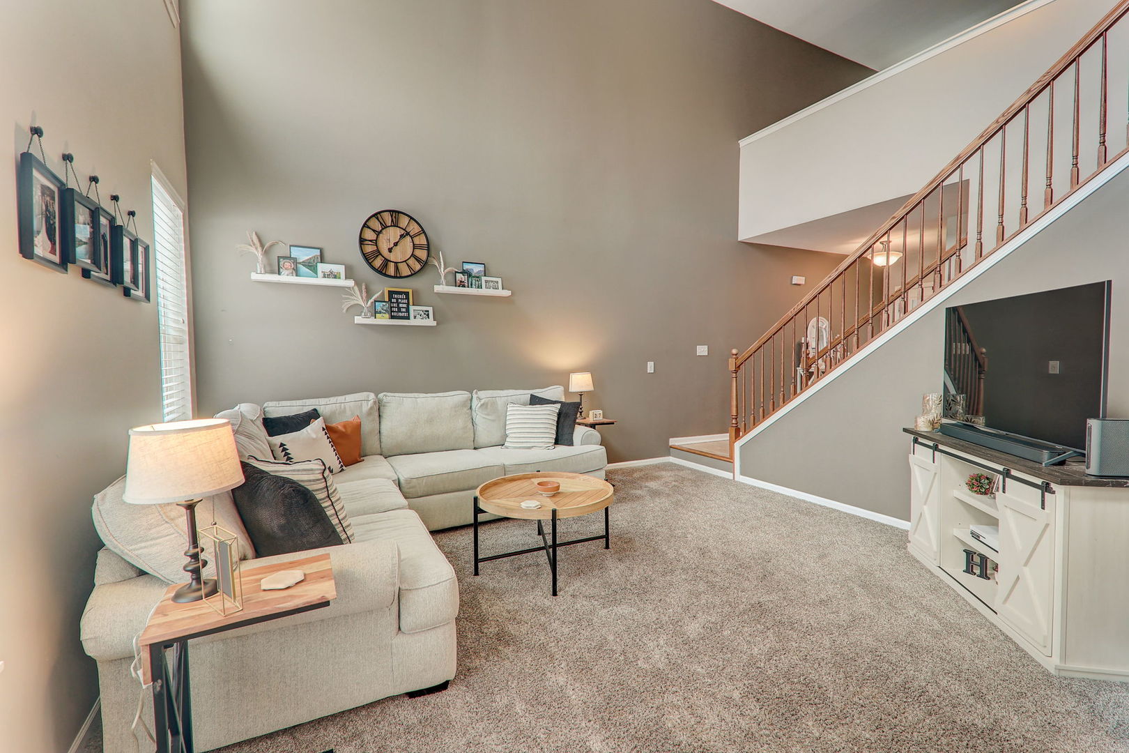 980 Oak Ridge Boulevard Elgin, IL 60120 - Photo 5 of 42 a living room with furniture and a flat screen tv