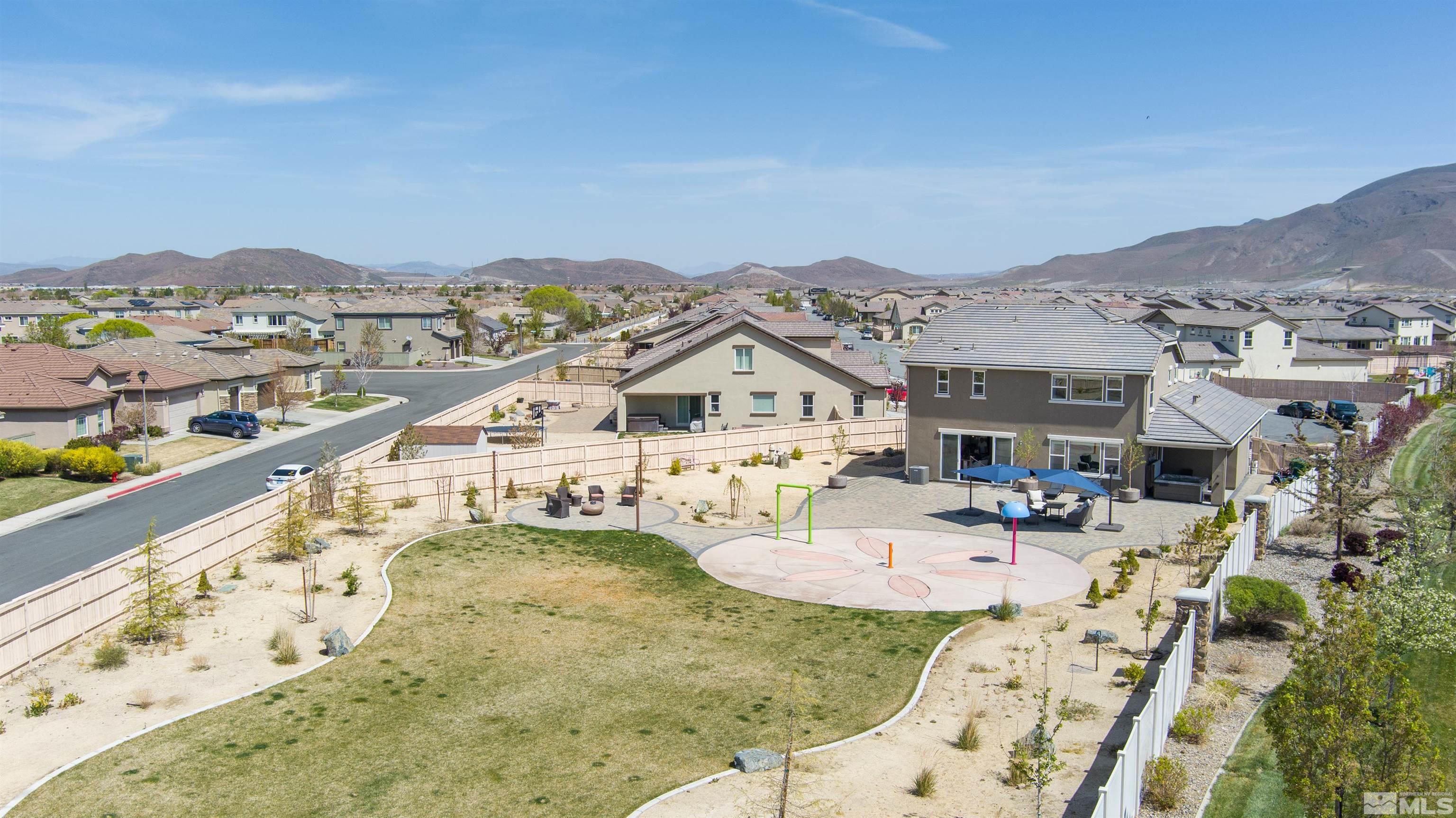 10485 Mott Court Reno, NV 89521 - Photo 1 of 40 a view of a terrace with lawn chairs