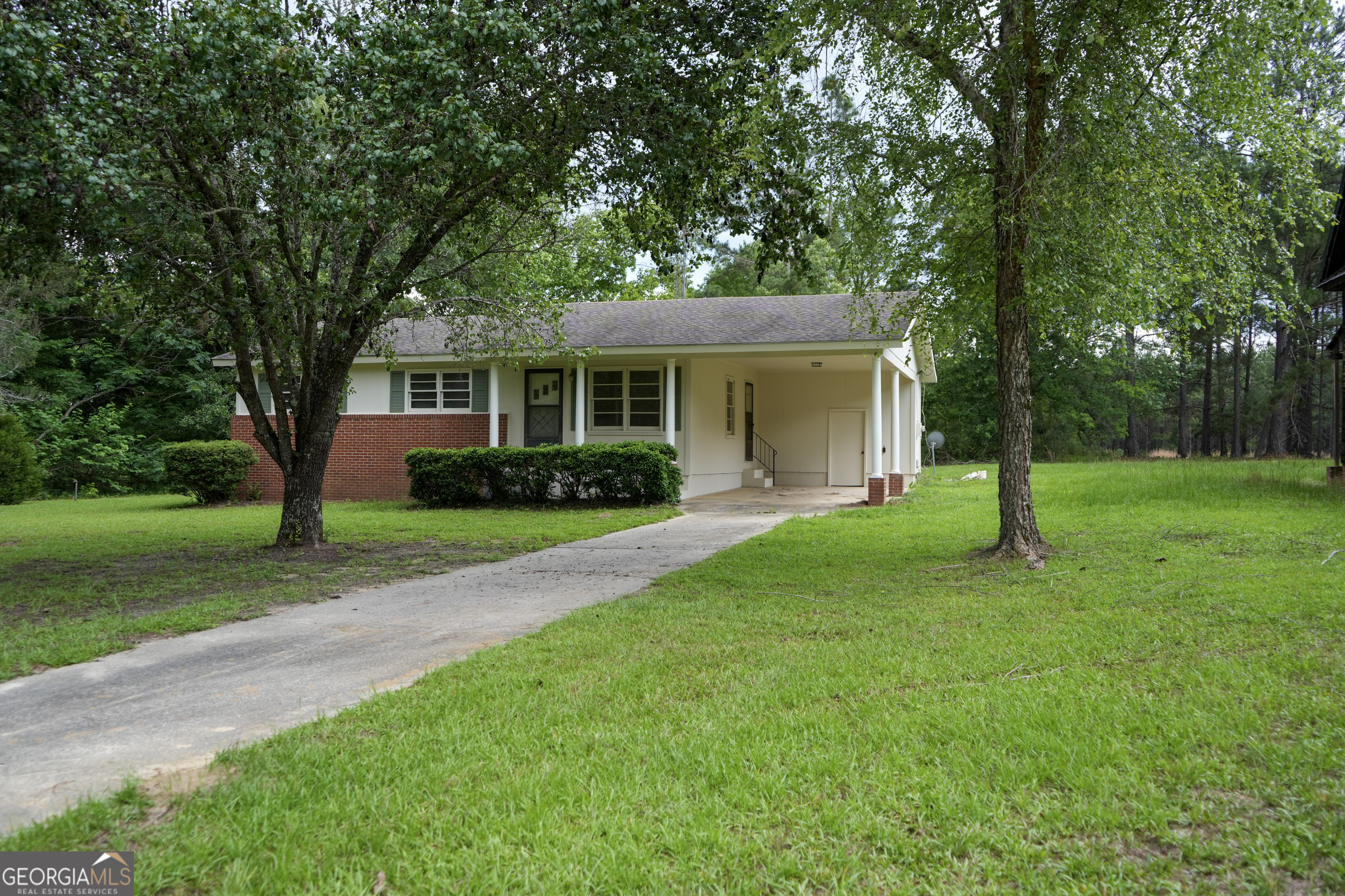 1869 Minter Blue Springs Road Rockledge, GA 30454 - Photo 8 of 45 a front view of house with yard and green space