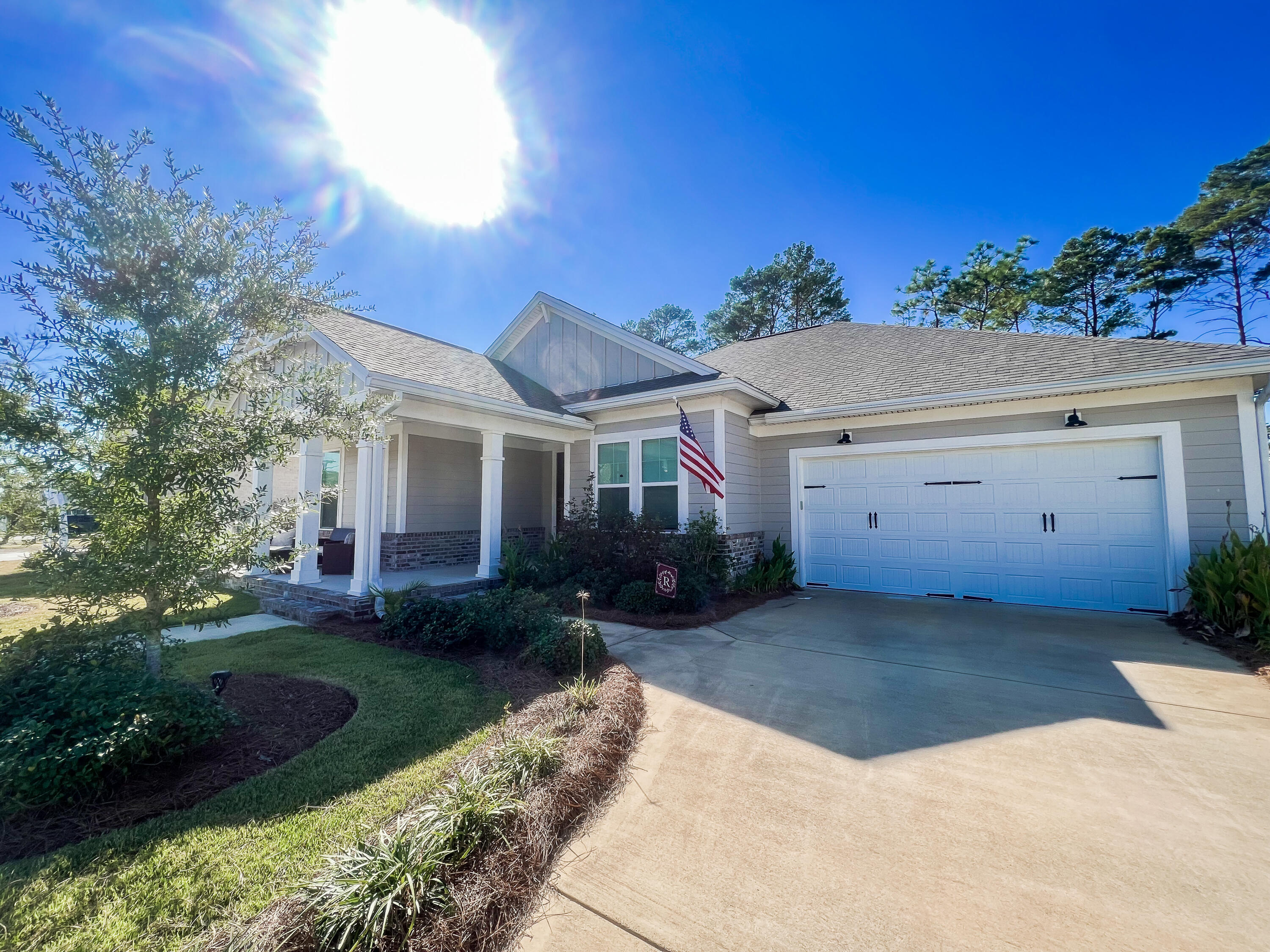 1159 Deer Moss Loop Niceville, FL 32578 - Photo 2 of 24 a view of a house with backyard and garden