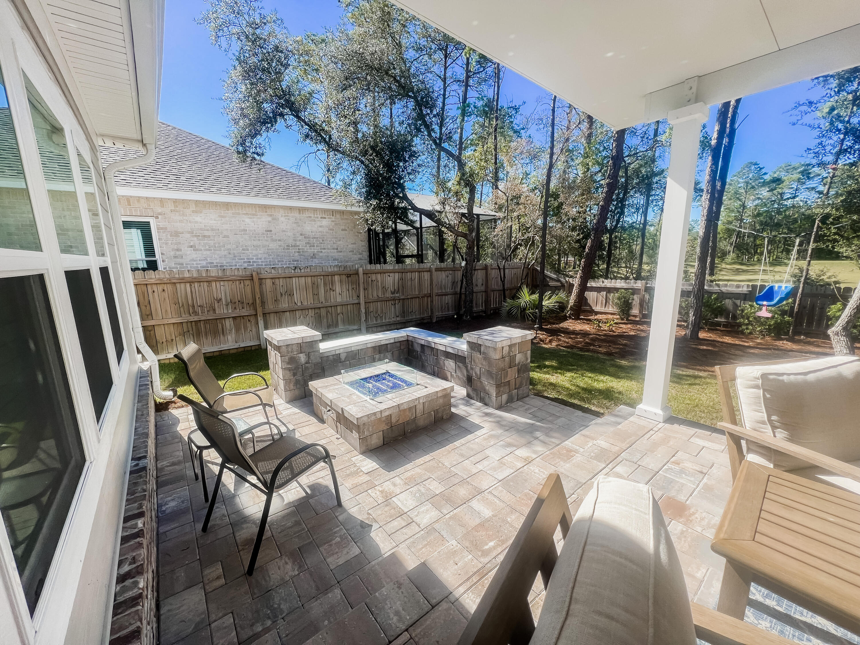 1159 Deer Moss Loop Niceville, FL 32578 - Photo 21 of 24 a view of backyard with outdoor seating
